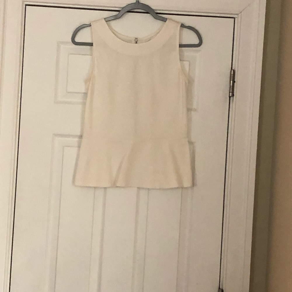 Beautiful cream colored peplum top
